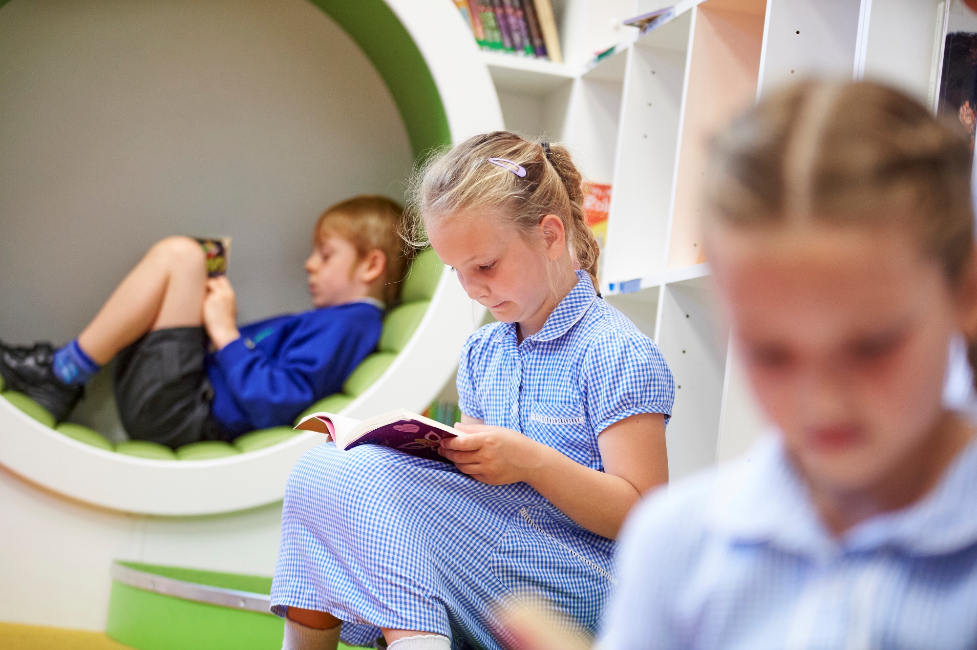 Children reading in the school library