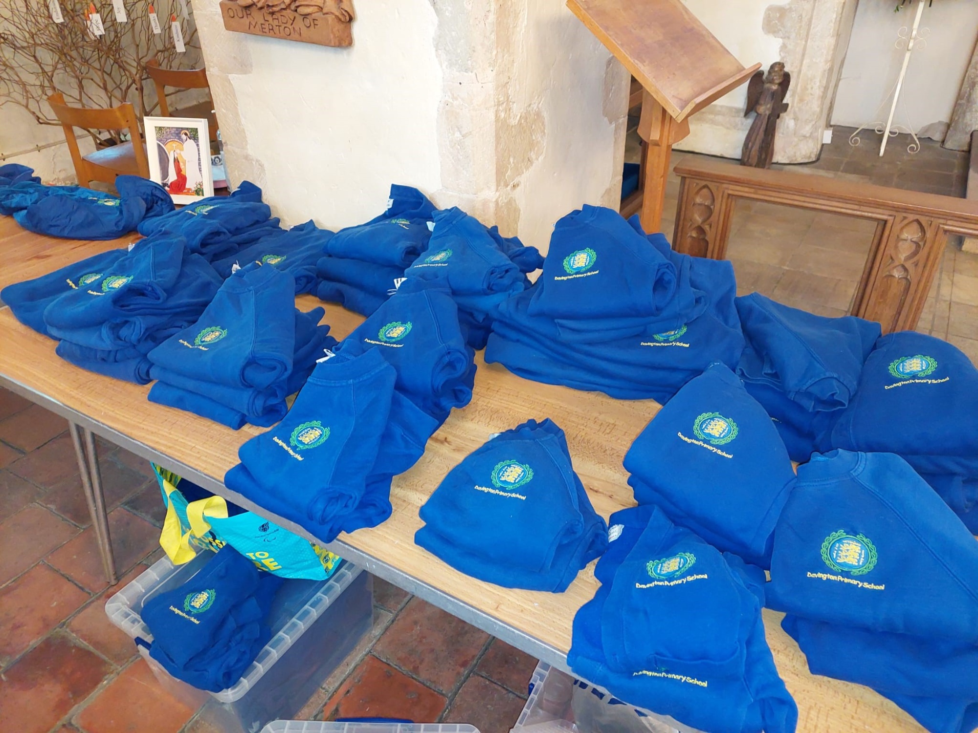 Second hand uniform displayed on a table ready to sell